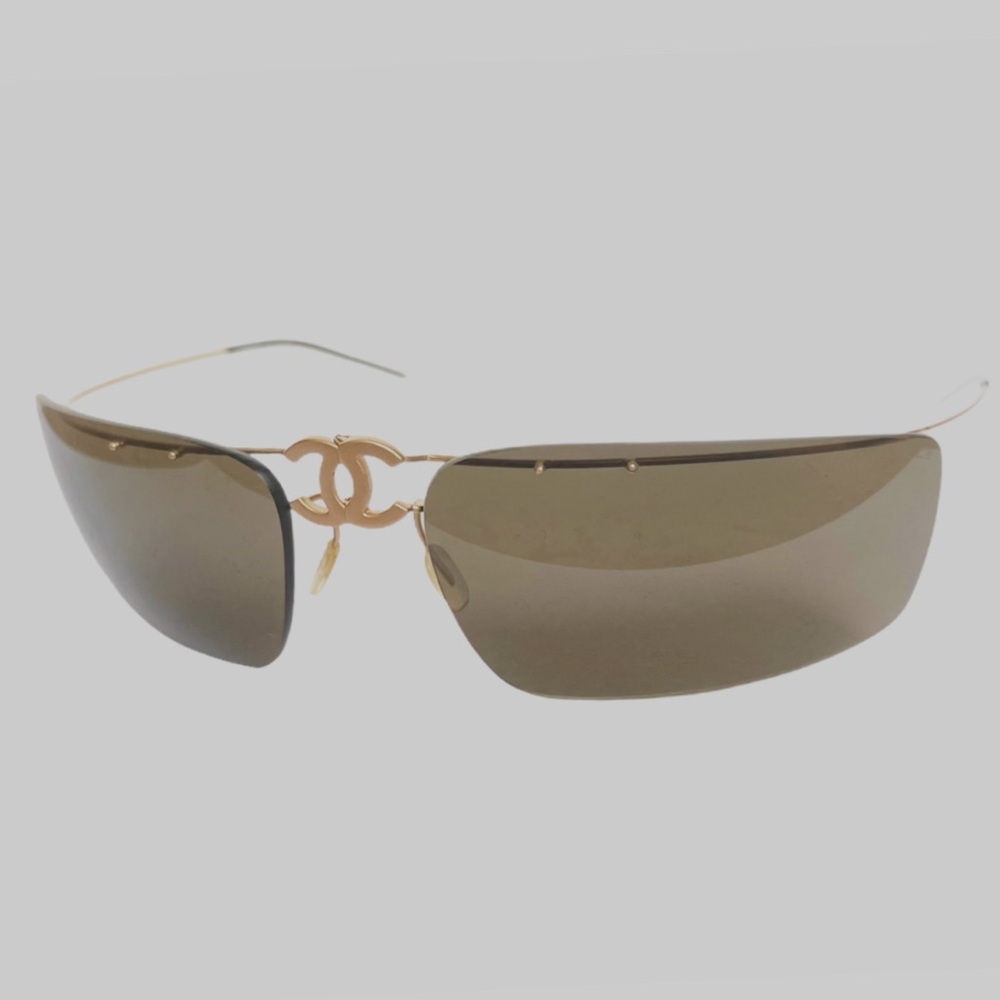 CHANEL Gold Rimless Glasses with Modern Design